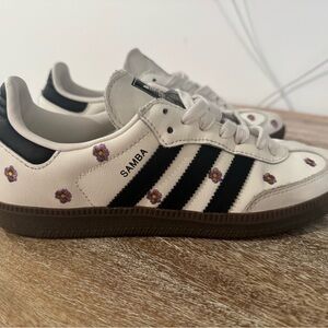 Adidas Samba Sneakers - White, Black, and Blue/Purple flowers.